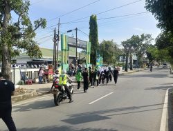 Satlantas Polres Langkat Melaksanakan Pengawalan dan Pengaturan Giat Gerak Jalan Dalam Rangka ospek Mahasiswa baru Akper pal