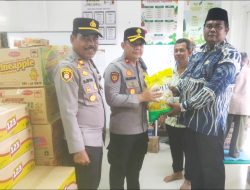 Kapolres Langkat Salurkan Bantuan Kapolri untuk Warga Terdampak Banjir di Tanjung Pura