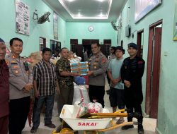 Polres Langkat Bersama Polres Binjai dan Asahan Salurkan Bansos untuk Warga Terdampak Banjir di Desa Bukit