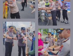 Bulan Suci Ramadhan 1447 H kapolres binjai berbagi takjil kepada masyrakat yg melintas di depan mapolres binjai