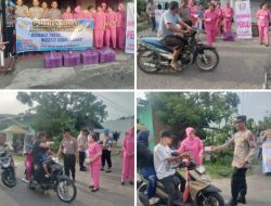 Kapolsek Binjai timur berbagi takjil kepada Masyrakat yang melintas di sekitaran Polsek